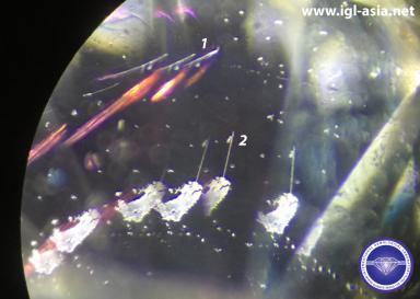 Laser Drilling and Fracture Filling Treatments in Natural Diamond